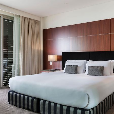 Pullman Auckland Hotel & Apartments Dış mekan fotoğraf A bedroom at the hotel